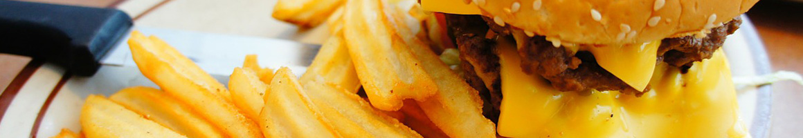 Eating Burger at George's Burgers restaurant in San Bernardino, CA.